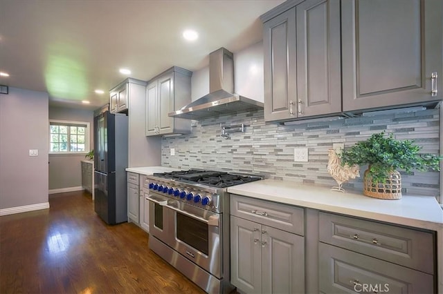 1375 N Euclid Ave, Upland, CA 91786 - kitchen with wall chimney exhaust hood, double oven range, freestanding refrigerator, gray cabinets, and recessed lighting