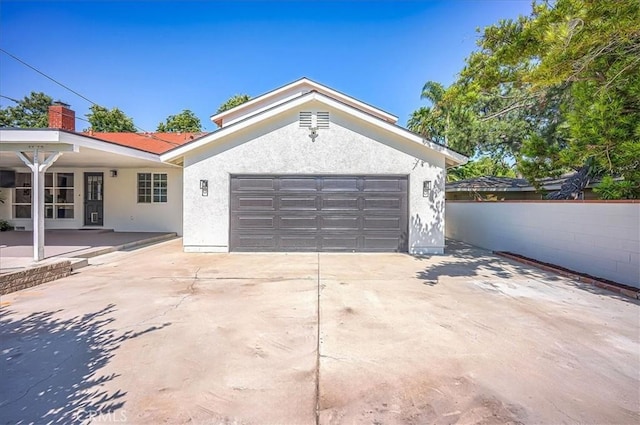 1375 N Euclid Ave, Upland, CA 91786 - view of front of home featuring stucco siding, concrete driveway, and an attached garage
