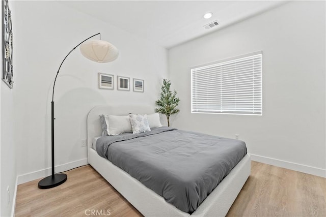 13154 Cedar St, Westminster, CA 92683 - bedroom featuring wood finished floors and baseboards