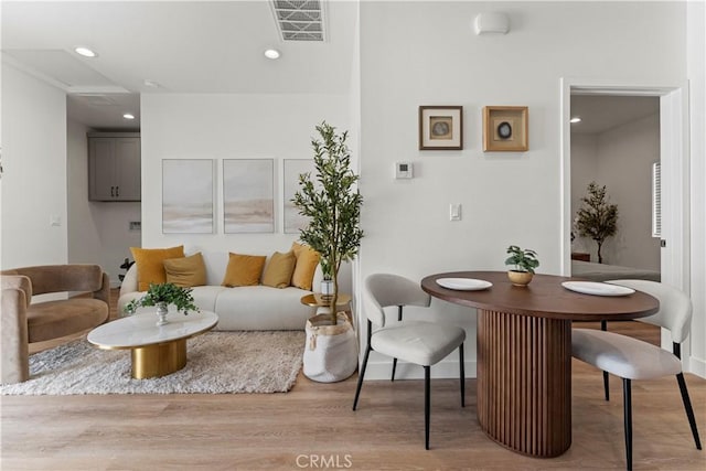 13154 Cedar St, Westminster, CA 92683 - living room featuring light wood-type flooring and recessed lighting