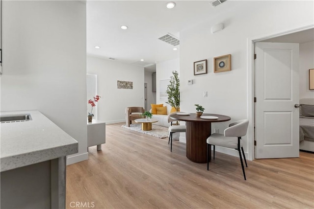13154 Cedar St, Westminster, CA 92683 - dining space featuring recessed lighting and light wood-style flooring