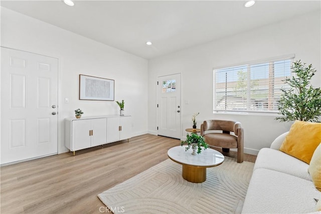 13154 Cedar St, Westminster, CA 92683 - living room with light wood-type flooring and recessed lighting