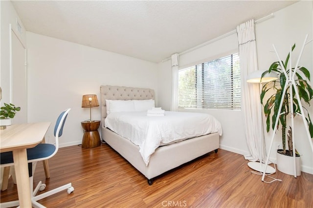 9 Morena Unit 28, Irvine, CA 92612 - bedroom featuring light wood-style flooring