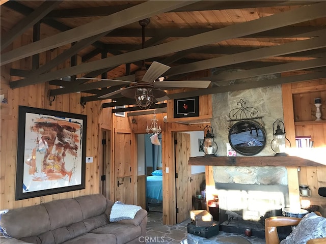 56564 Nelson Ave, Yucca Valley, CA 92284 - living area with wood walls and a ceiling fan