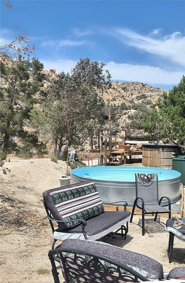 56564 Nelson Ave, Yucca Valley, CA 92284 - view of patio with a swimming pool