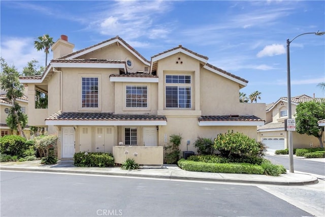 27982 Via Del Agua, Laguna Niguel, CA 92677 - multi unit property with stucco siding, a tiled roof, and an attached garage
