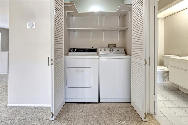 27982 Via Del Agua, Laguna Niguel, CA 92677 - washroom with washer and clothes dryer and baseboards