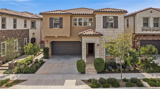 1776 Canyon Oaks Ln, Lake Forest, CA 92610 - mediterranean / spanish house with a garage, stone siding, a tiled roof, stucco siding, and concrete driveway