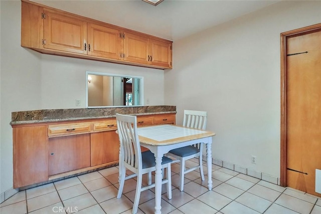 17654 Prairie St, Northridge, CA 91325 - dining space with light tile patterned floors