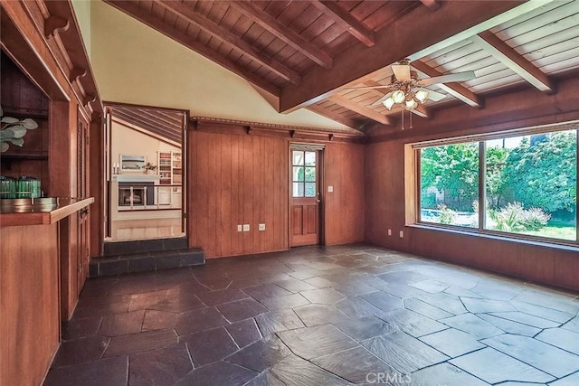 17654 Prairie St, Northridge, CA 91325 - spare room featuring wood ceiling, ceiling fan, and stone tile floors