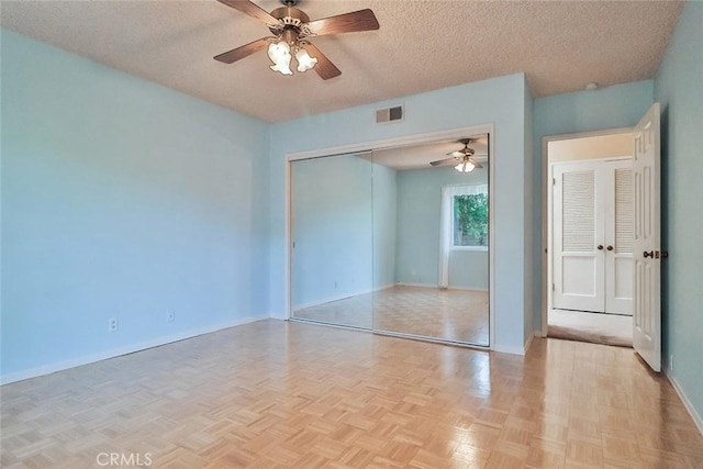 17654 Prairie St, Northridge, CA 91325 - unfurnished bedroom with a textured ceiling, a closet, and ceiling fan