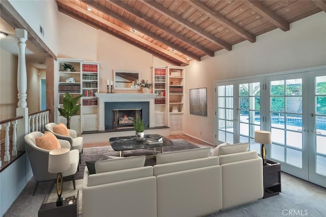 17654 Prairie St, Northridge, CA 91325 - living area featuring a wooden ceiling with exposed beams, carpet flooring, high vaulted ceiling, and a fireplace with raised hearth