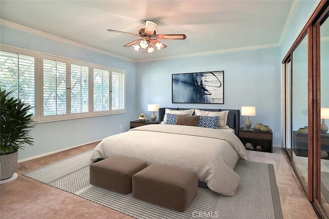 17654 Prairie St, Northridge, CA 91325 - carpeted bedroom featuring crown molding, a closet, and a ceiling fan