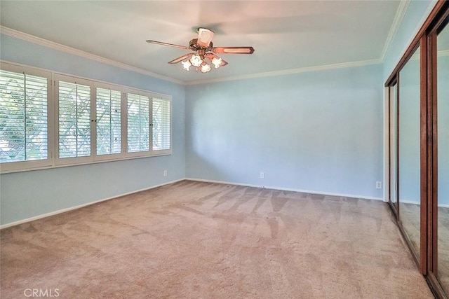 17654 Prairie St, Northridge, CA 91325 - empty room with carpet flooring, ceiling fan, and ornamental molding