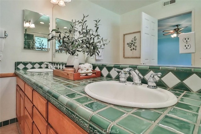 17654 Prairie St, Northridge, CA 91325 - bathroom with double vanity and ceiling fan