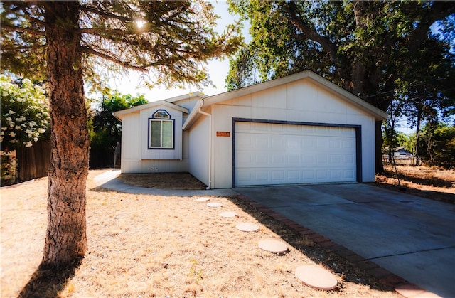3556 Cypress St, Clearlake, CA 95422 - ranch-style house with concrete driveway and an attached garage