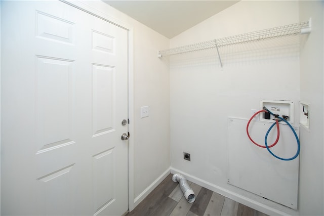 3556 Cypress St, Clearlake, CA 95422 - washroom with hookup for a washing machine, wood finished floors, and electric dryer hookup