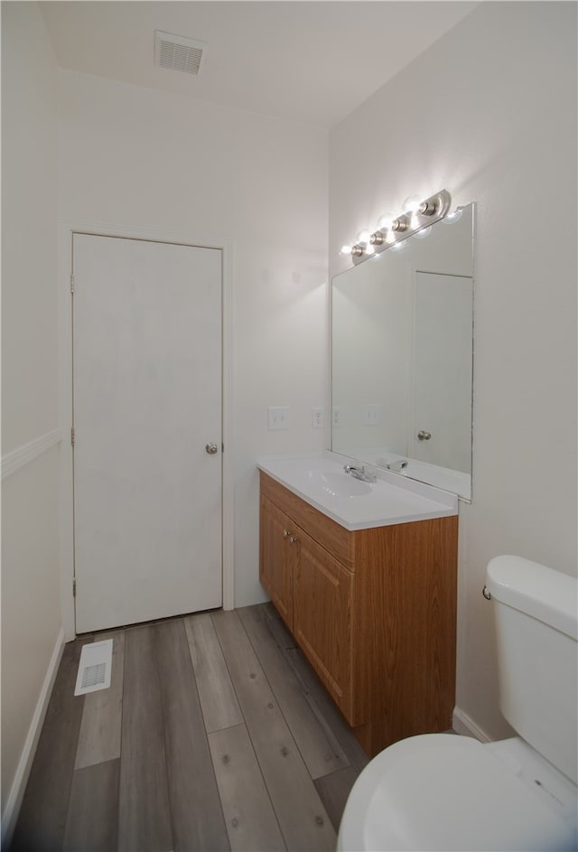 3556 Cypress St, Clearlake, CA 95422 - half bath featuring vanity and wood finished floors