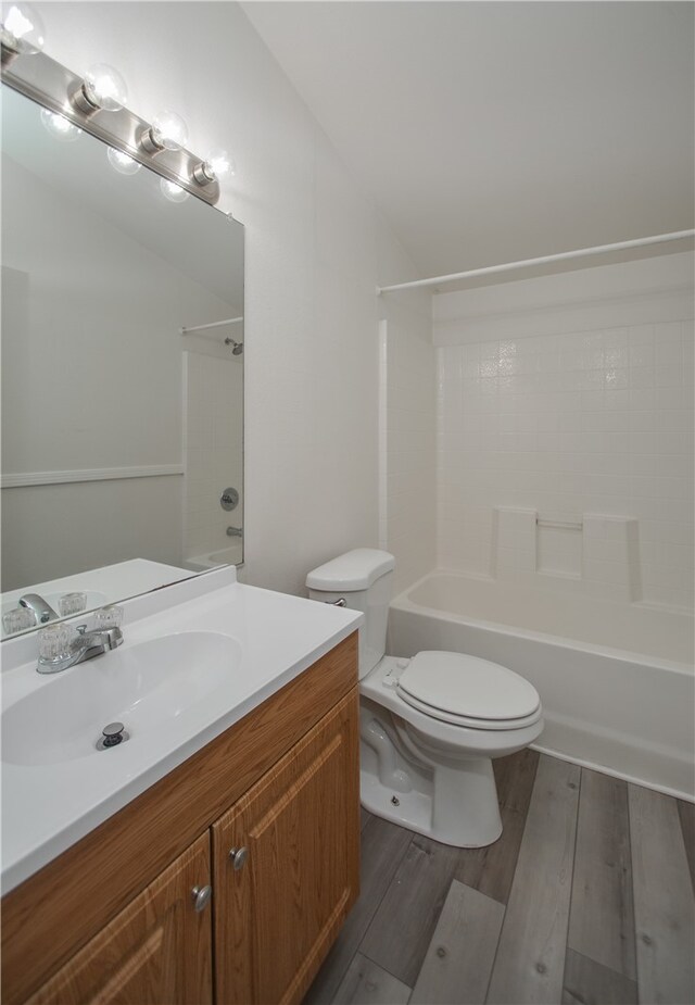 3556 Cypress St, Clearlake, CA 95422 - bathroom featuring vanity, washtub / shower combination, and wood finished floors