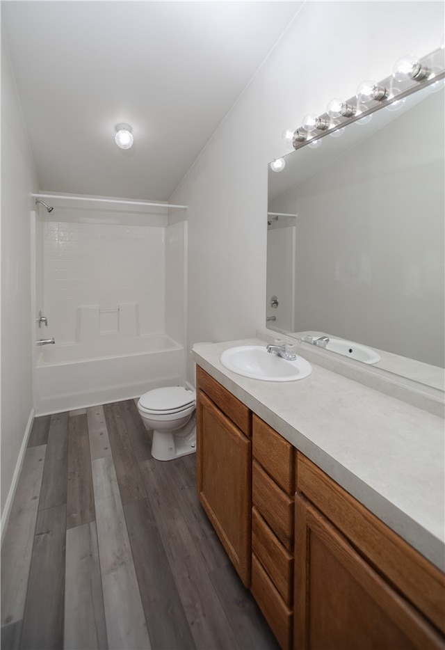 3556 Cypress St, Clearlake, CA 95422 - bathroom featuring vanity, wood finished floors, and shower / bathtub combination