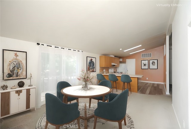 3556 Cypress St, Clearlake, CA 95422 - dining space with lofted ceiling and baseboards