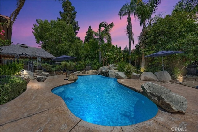 1806 Briercliff Ct, Bakersfield, CA 93311 - pool at dusk featuring a patio