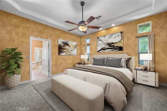 1806 Briercliff Ct, Bakersfield, CA 93311 - carpeted bedroom featuring a raised ceiling, multiple windows, ensuite bath, and recessed lighting