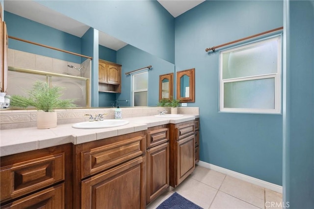 1806 Briercliff Ct, Bakersfield, CA 93311 - bathroom with tile patterned floors, a shower stall, and double vanity
