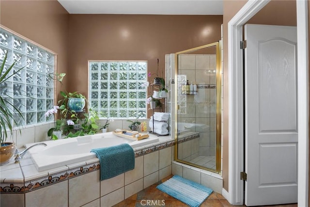 1806 Briercliff Ct, Bakersfield, CA 93311 - bathroom with tile patterned flooring, a garden tub, and a stall shower