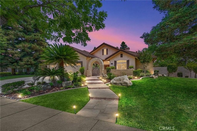 1806 Briercliff Ct, Bakersfield, CA 93311 - view of front of house with stucco siding, a lawn, and a chimney