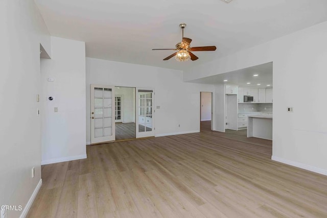 4120 Abbott Dr, Bakersfield, CA 93312 - unfurnished living room with a ceiling fan and light wood-style flooring