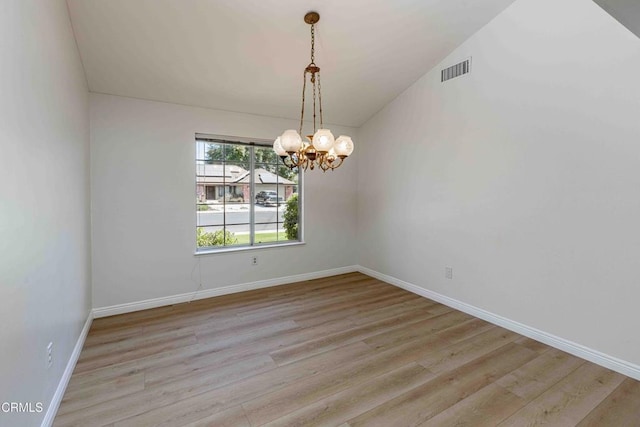 4120 Abbott Dr, Bakersfield, CA 93312 - unfurnished room featuring a chandelier and light wood-style floors