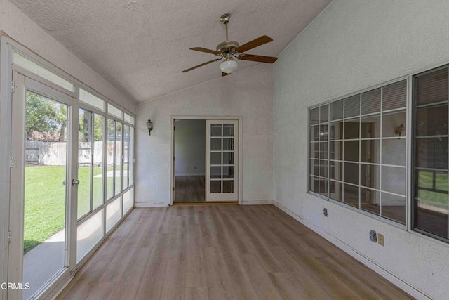 4120 Abbott Dr, Bakersfield, CA 93312 - unfurnished sunroom with vaulted ceiling, ceiling fan, wood finished floors, a textured ceiling, and a textured wall
