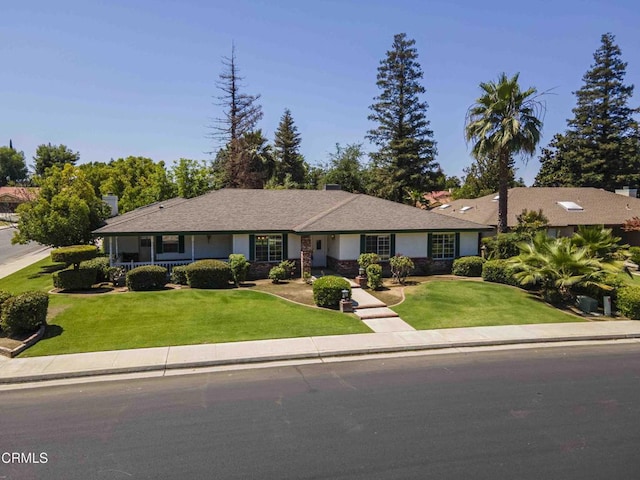 4120 Abbott Dr, Bakersfield, CA 93312 - ranch-style home with a front lawn