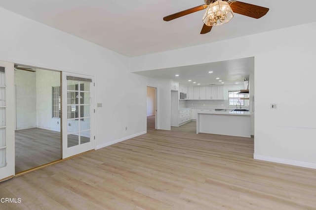 4120 Abbott Dr, Bakersfield, CA 93312 - unfurnished living room featuring a ceiling fan, light wood-type flooring, and recessed lighting