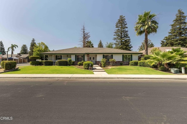 4120 Abbott Dr, Bakersfield, CA 93312 - ranch-style house featuring a front lawn