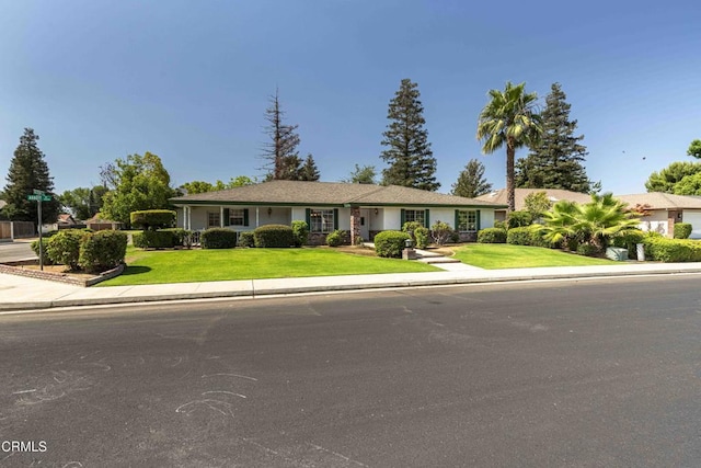 4120 Abbott Dr, Bakersfield, CA 93312 - ranch-style home featuring a front lawn