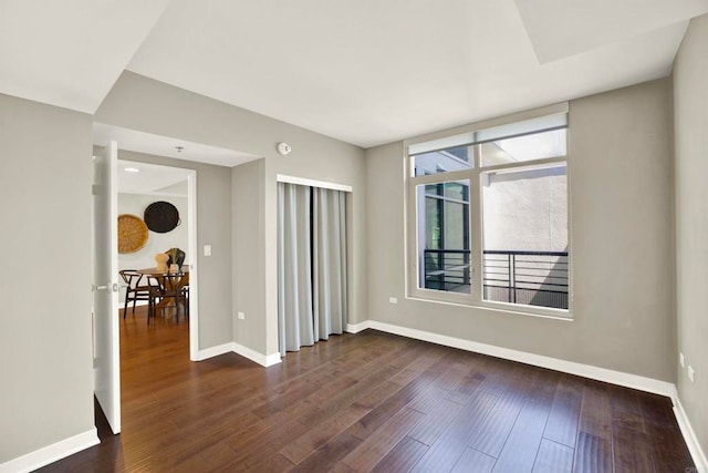 425 W Beech St Unit 417, San Diego, CA 92101 - spare room featuring dark wood finished floors