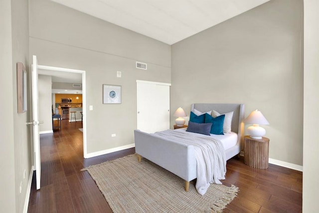 425 W Beech St Unit 417, San Diego, CA 92101 - bedroom with dark wood-type flooring and lofted ceiling