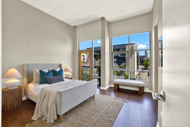 425 W Beech St Unit 417, San Diego, CA 92101 - bedroom featuring hardwood / wood-style flooring and baseboards