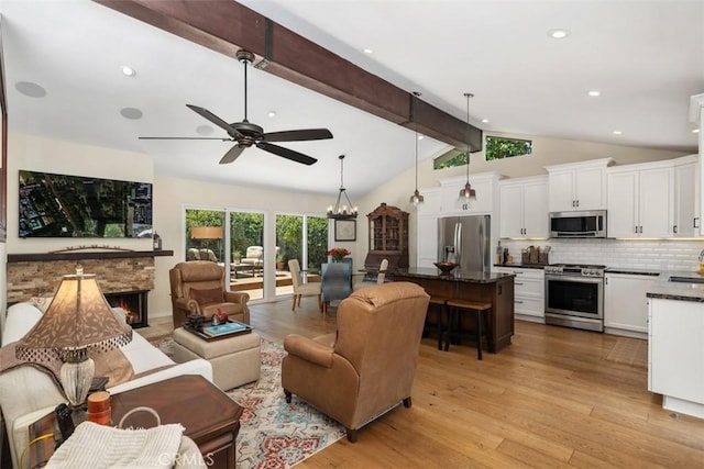 28131 Rubicon Ct, Laguna Niguel, CA 92677 - living room featuring a ceiling fan, light wood-style floors, a chandelier, recessed lighting, and a fireplace