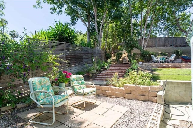 869 Phillips St, Vista, CA 92083 - fenced backyard featuring a patio area