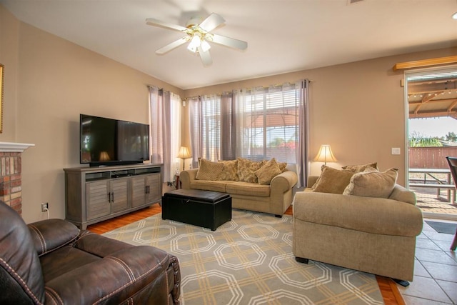 2414 Falcon Valley Dr, Chula Vista, CA 91914 - living area with healthy amount of natural light, a ceiling fan, and light wood finished floors