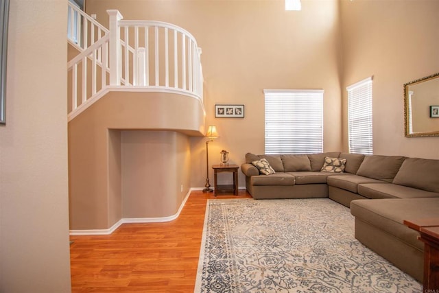 2414 Falcon Valley Dr, Chula Vista, CA 91914 - living room featuring wood finished floors and a high ceiling