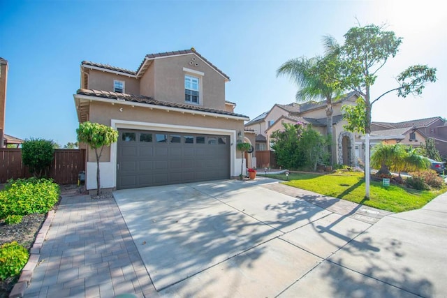 2414 Falcon Valley Dr, Chula Vista, CA 91914 - mediterranean / spanish home with driveway, stucco siding, an attached garage, and a tiled roof
