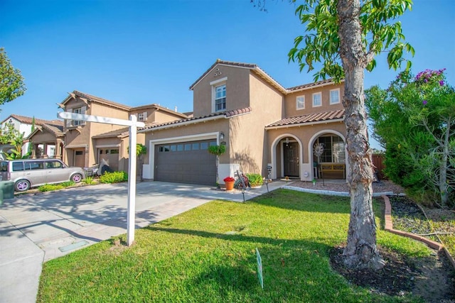 2414 Falcon Valley Dr, Chula Vista, CA 91914 - mediterranean / spanish-style house featuring driveway, stucco siding, and a tiled roof