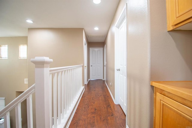 2414 Falcon Valley Dr, Chula Vista, CA 91914 - corridor featuring dark wood-style floors, recessed lighting, and an upstairs landing