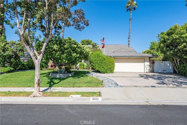 3032 Pietro Dr, Hacienda Heights, CA 91745 - view of property hidden behind natural elements featuring concrete driveway and a garage