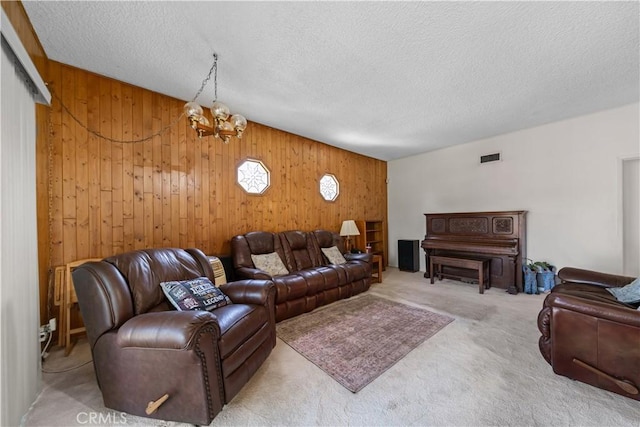 3032 Pietro Dr, Hacienda Heights, CA 91745 - living area with wooden walls, a chandelier, carpet floors, and a textured ceiling