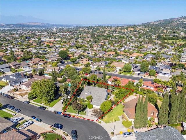 3032 Pietro Dr, Hacienda Heights, CA 91745 - aerial perspective of suburban area with property parcel outlined and a mountain backdrop